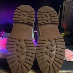 Timberland I bought them but never wore them and the box is alright